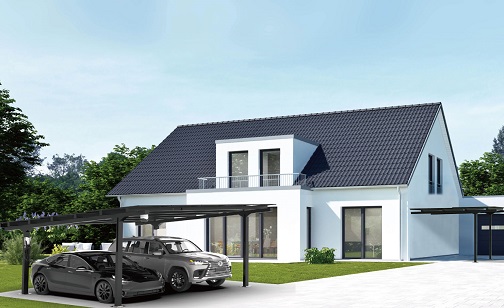 A solar-powered carport is parked in front of a house